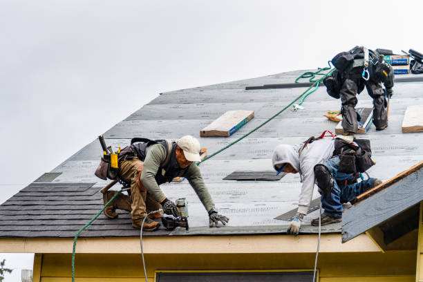 Professional Gutter Installation technician working in West Warren, MA